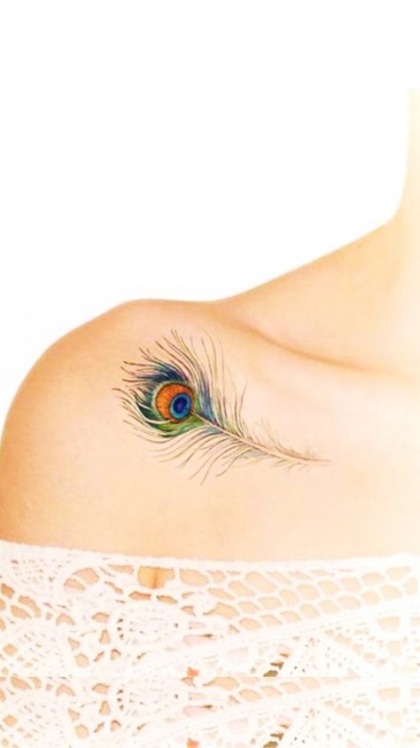 Explore our special collection of unique Peacock Feather Tattoo Designs and why they are so popular among many celebs including Cardi B, Paris Jackson, and more! Peacock Feather Tattoos For Women, Peacock Feathers Tattoo, Tattoo Peacock Feather, Peacock Feather Tattoo Design, Small Peacock Tattoo, Peacock Feather Tattoo Meaning, Olivia Tattoo, Feather Tattoo Placement, Feather Tattoo Ideas