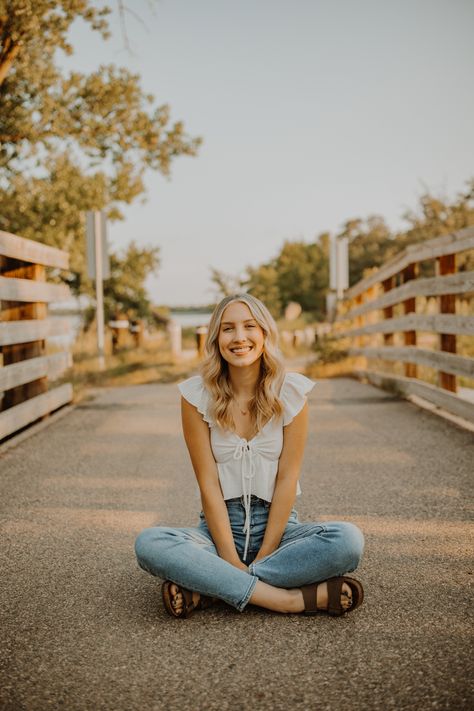 Summer Senior Sessions are the main reason why I love being a Minnesota Senior Photographer. For Emily’s senior session we went to Glendalough State Park in Battle Lake Minnesota and took full advantage of all of my favorite spots in the park. From the lake, to different bridges, trails and my favorite the wildflowers. Glendalough State Park is the perfect location for you nature loving seniors for your senior session! Trail Senior Pictures, Senior Picture Ideas Minnesota, Senior Picture On Bridge, Fence Senior Pictures, Minnesota Senior Pictures, Senior Bridge Pictures, Senior Pics Lake, Senior Picture Bridge, Bridge Poses Photography