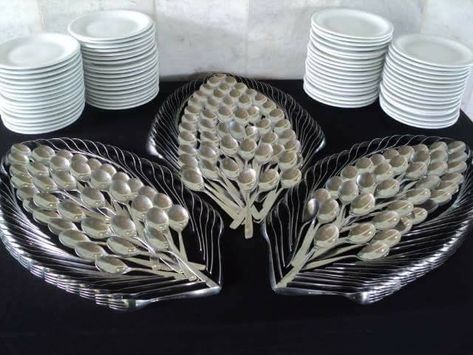 No automatic alt text available. Silverware Display, Plates And Silverware, Silver Ware, Cutlery Art, Catering Display, Spoon Art, Dining Etiquette, Buffet Set, Table Manners