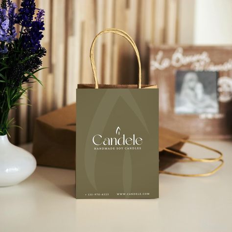 Exquisite yet minimal packaging & branding for Candele. From the refined logo to the sleek business cards, shopping bags and packaging stickers, every detail exudes elegance. #graphicdesign #candle #candlebusiness #soycandles #candlemaking #promotions #brandingdesign #brandbrief #design #illustration #creative #bhcandele #briefhaus #haushonors #smallbusiness #businesscards #branding #instagram #socialmediamanagement #contentcreation #flyers #invitations #logodesign #logo #brands #graphiccre... Candle Logo, Candle Brand, Minimal Packaging, Illustration Creative, Handmade Soy Candle, Candle Branding, Candle Business, Packaging Stickers, Business Cards Creative