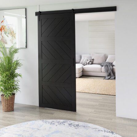 Gracie Oaks Clintondale Paneled Manufactured Wood and Metal Barn Door with Installation Hardware Kit | Wayfair Wood Barn Door, Barn Door Designs, Barn Door Kit, Modern Barn Door, Black Barn, Glass Barn Doors, Metal Barn, Modern Farmhouse Design, Diy Barn Door