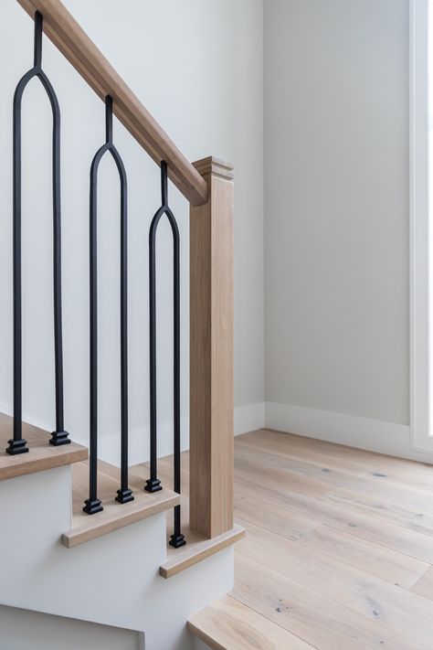 Stair Spindle Ideas Metal, Brass Stair Balusters, White Oak And Iron Staircase, Transitional Modern Staircase, Staircase Spindles Ideas, Oak And Metal Staircase, Split Oval Baluster, Oak Stairs With Iron Spindles, Basement Staircase Design