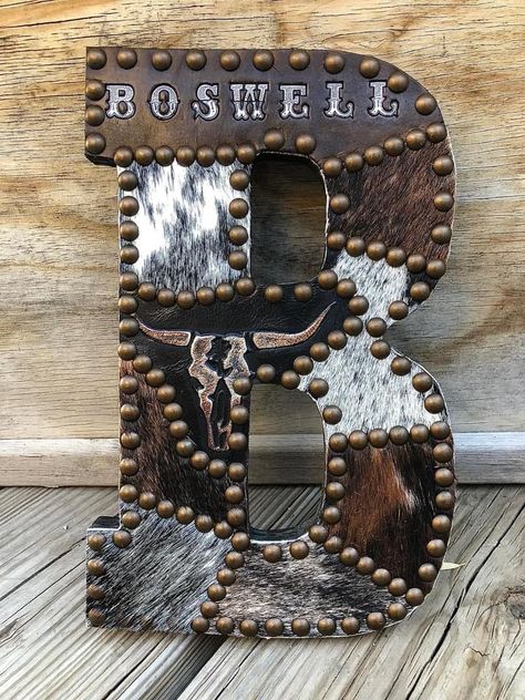 Western Home Decor Diy Crafts, Western Diy Projects, Western Wood Projects, Cowhide Letters, Western Office Decor Ideas, Diy Western Home Decor, Cowhide Wall Decor, Western Diy Decor, Cowhide On Wall Ideas