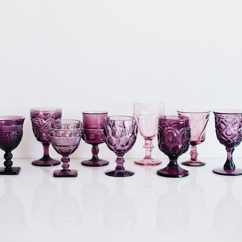 PRESSED GLASSWARE // PURPLE An assortment of varying pressed glass pattern goblets made of milk glass. Classically vintage in style. Rental Price: $3.05 Goblet:  6-8oz Color: Purple   **A {bb} CURATED ASSORTMENT. Pressed Glassware, Unique Flatware, Flatware Design, Luxury Tableware, Colored Glassware, Glass Pattern, Wine Glass Set, Wine Goblets, Art Glass Vase