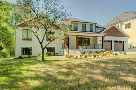 Quad Level House Exterior, Split Level Windows, Tri Level House Exterior Curb Appeal, 60s Split Level Remodel Exterior, White Split Level Exterior, Split Level Garage Addition, Split Level Renovation Before And After, 1970s Split Level House Exterior Remodel, Exterior Remodel Split Level