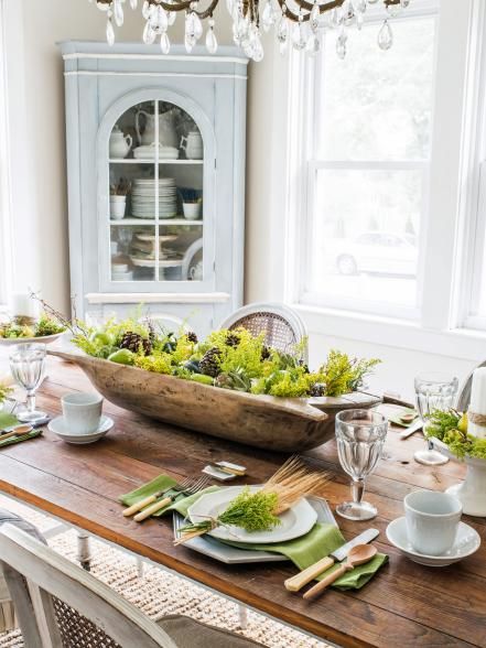 Add a rustic touch to your Thanksgiving table with a low centerpiece created by filling a vintage dough bowl or wooden trencher with seasonal pumpkins, gourds, pinecones and flowering branches. Fall Dough Bowl, Rustic Fall Centerpieces, Dough Bowl Centerpiece, Thanksgiving Entertaining, Rustic Thanksgiving, Bowl Centerpiece, Fall Flower Arrangements, Easy Fall Crafts, Wooden Dough Bowl