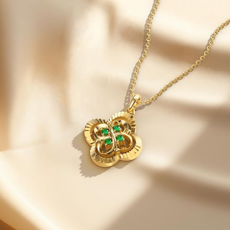 Behold the "Infinite Clover Charm Pendant Necklace," a necklace that artfully intertwines the enduring symbol of the four-leaf clover with the timeless infinity sign. Each leaf, formed by a loop of the infinity symbol, represents an unending cycle of luck and prosperity, merging with the next to create a harmonious whole.The heart of the clover is adorned with sparkling stones, illuminating the center where all infinite paths converge, a reminder of the precious moments that are the heart of our Symbol Jewelry, Gold Jewellry, Infinity Sign, Y2k Jewelry, Clover Charm, Gold Name Necklace, Infinity Symbol, Charm Pendant Necklace, The Infinity