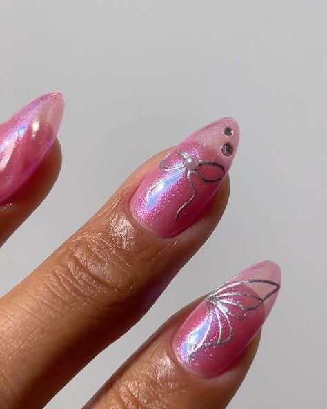 Melanie Graves on Instagram: "Butterfly wings & bows 💕 — #springnails #chromenails #springnailart #butterflynails" Almond Nail Butterfly, Fairy Wing Nails, Butterfly Wing Nails Acrylics, Butterfly Wing Nail Art, Wing Nails, Butterfly Wing Nails, Butterfly Nail Charm Nails, Butterfly Nails, Spring Nail Art