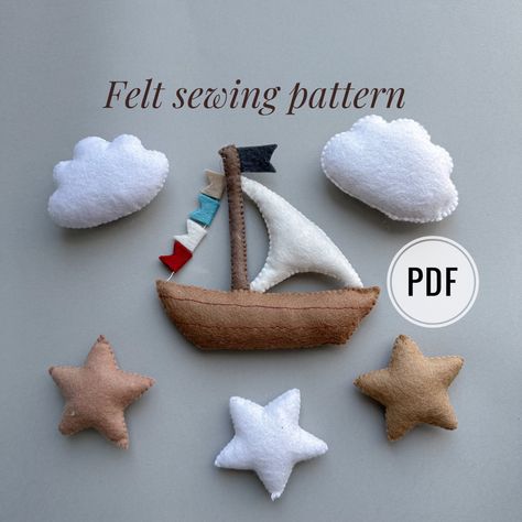 Set of 3 pdf felt pattern, sewing instruction and 4 video stitch that will help beginners learn to sew.Ship ( 11 cm -4.4 inc) #ship under the sea pattern felt sewing pattern for boy nursery decor #handmade baby mobile felt craft for beginners hand #sewingtutorial pattern pirates ship ornament diy toy felting haw to sew baby mobile DIY felt garland baby shower gift idea handmade plush #felt pattern stuffed toy pdf pattern sew tutorial felt beginner stars ornament moon pirate ship #plush toy tutor Kawaii, Pirates Ship, Felt Toys Diy, Mobile Diy, Felt Sewing, Sea Pattern, Sew Baby, Funny Ornaments, Felt Crafts Patterns