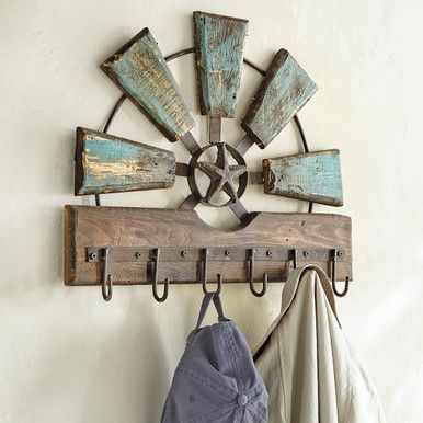 Exclusive Item - Hang your coats and hats in western style with this rack featuring a windmill design and lone star accent. Wood and metal construction with a weathered turquoise finish. Six hooks. 20"W x 3"D x 16"H. Liquor Bouquet, Wooden Windmill, Windmill Wall Decor, Metal Coat Rack, Ranch Ideas, Windmill Decor, Tree Coat Rack, Rustic Coat Rack, Black Forest Decor