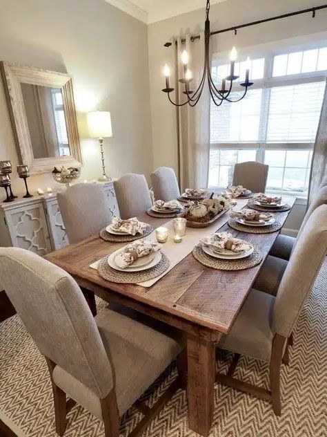 28 Dining Room Decor Ideas: Spice Up Your Supper Space! Dining Room Table With Grey Walls, Dining Area Set Up, Bare Wall In Dining Room Ideas, Beige And Gold Dining Room, Last Supper Dining Room Decor, Dining Room Setting Ideas, Brown And Gold Dining Room Decor, Dining Room Staging Ideas, Dining Room Ideas Dark Wood Table