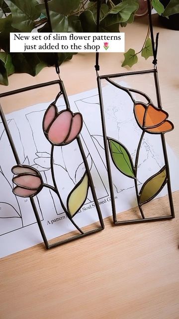 Wild Soul Stained Glass Patterns on Instagram: "Happy Thursday lovelies! Hope your all having a fabulous week 🙌🏼 I’ve just added a new pattern set to the shop which I just finished today….a set of 3 slimline flower panels each flower in a different whimsical design! 🌷 . These were so fun to make and I love the thought of them all hanging up in a window together when I get round to finding them a home! 💜 . . ." Stained Glass Patterns Flowers, Stained Glass Flowers Patterns, Stained Glass Spring, Flower Stained Glass, Diy Staining, Glass Suncatchers, Stained Glass Pattern, Flower Panels, Stained Glass Decor