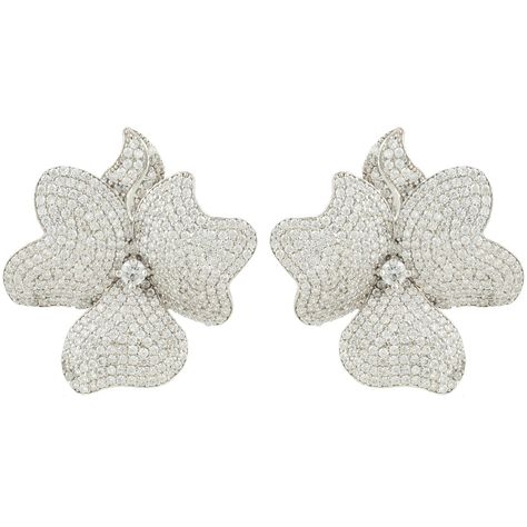 Ideal for those who love statement jewellery with added sparkle. Make these floral inspired earrings your new timeless treasures. These large flower stud earrings are adorned with sparkling cubic zirconia which add a touch of sophisticated style to any outfit.  Pierced earrings with post back and butterfly fastening. M Statement Wedding Earrings, Large Stud Earrings, Stud Earrings Silver, Silver Flower Earrings, Necklace Flower, Flower White, Statement Jewellery, Flower Stud Earrings, Hair Spray