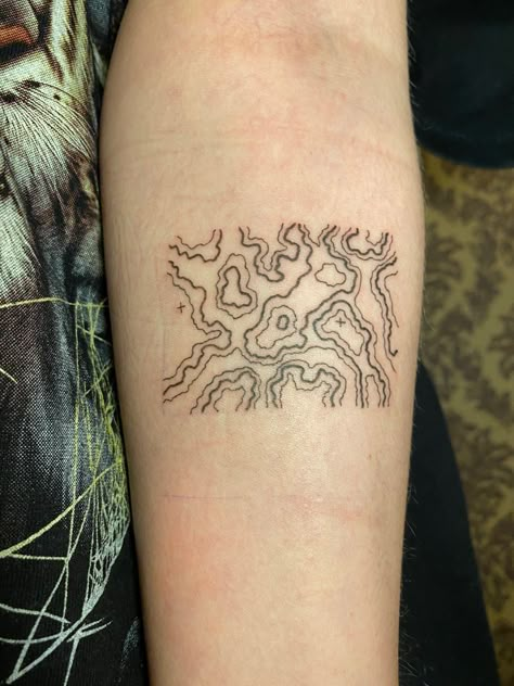 Topographic tattoo Minimalist Map Tattoo, Topo Lines Tattoo, Symetric Tattoo Aesthetic, Mens Linework Tattoo, Gis Tattoo, Environmental Science Tattoo, Topo Map Tattoo, Geography Tattoo Ideas, Geological Tattoo