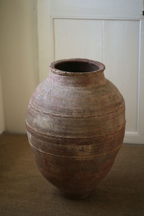 Antique vessels from Turkey | urn, olive jar, terracotta pots One of a kind, vintage pieces to give your interior that modern farmhouse, classic Cotswold cottage, or timeless country home style. Décor pieces that are earthy, organic and artisan made, originally used to store olive oil and grains, now repurposed as unique antique homewares. With their own imperfections, please expect that terracotta pots are sold in their original condition, naturally aged with rustic patina and texture. Mediterranean Pots, Antique Vessels, Country Home Style, Vintage Terracotta Pots, Clay Palette, Cotswold Cottage, Antique Clay Pots, Olive Jar, Bamboo Decor