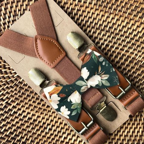 This floral emerald bow tie & brown leather suspender set is a great choice for family photos, groomsmen gift, weddings, ring bearer outfit, gift, birthday celebration or any other special occasion. ❤ **Please Specify**  Bow Tie Only (w/ Clip or Neck Strap), Suspenders Only, or Bow Tie Only & Susp (Bow Tie and Suspenders) SUSPENDERS- One Pair of our Quality Suspenders BOW TIE - One Bow Tie on White Adjustable STRAP or Alligator CLIP PET BOWTIE w/ Elastic Loops- Slips on a Dog/Cat/Pet Collar **CL Emerald Green Bow Tie, Green Floral Tie, Weddings Ring, Boho Wedding Accessories, Ring Bearer Gift, Green Weddings, Ring Bearer Gifts, Green Bow Tie, Rustic Boho Wedding