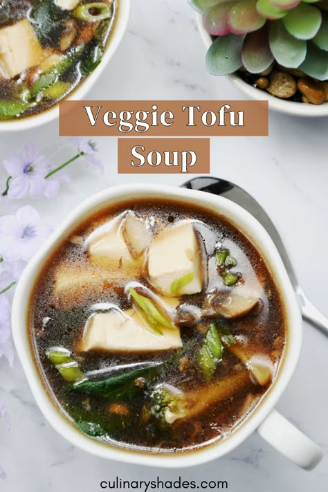 This warm and comforting vegetable and tofu soup is perfect for chilly days. Packed with veggies and soft tofu, it’s a simple comfort food for any season Soft Tofu Recipes Dinner, Tofu Vegetable Soup, Tofu Recipes Soup, Tofu In Soup, Asian Tofu Soup, Tofu Soups, Tofu Soup Recipes, Soft Tofu Recipes, Vegetable Soup Vegan