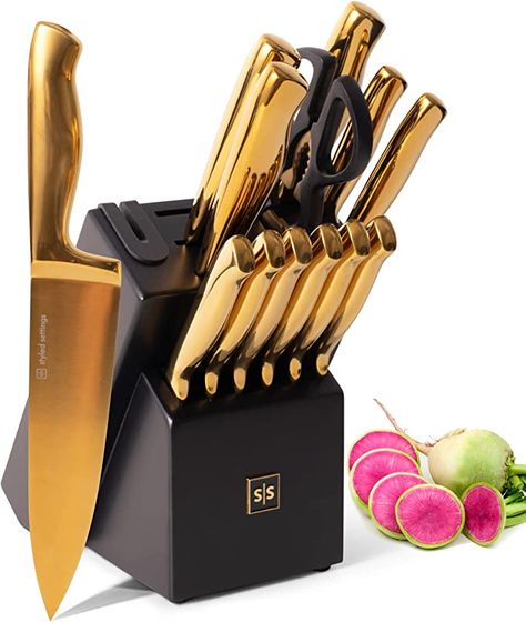 Looking for a way to modernize your kitchen? This elagant knife set is the perfect way!

Description: Black and Gold Knife Set with Block - 14 Piece Gold Knife Set with Sharpener Includes Full Tang Gold Knives and Self Sharpening Knife Block Set - Black and Gold Kitchen Accessories, Gold Kitchen Decor White Kitchen Knife Set, Gold Knife Set, Gold Kitchen Utensils, Black And Gold Kitchen, Gold Utensils, Kitchen Knife Holder, Gold Knife, Gold Kitchen Accessories, Black Kitchen Decor