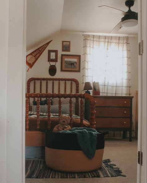 Vintage style little boys room with a rag rug, green dresser, vintage art, and plaid curtains Vintage Farm Bedroom, Board And Button With Wallpaper, Antique Kids Room, Modern Vintage Boys Room, Boys Shared Room Ideas Small Bedrooms, Cottagecore Boys Room, Antique Boys Room, Vintage Americana Nursery, Vintage Boy Bedroom