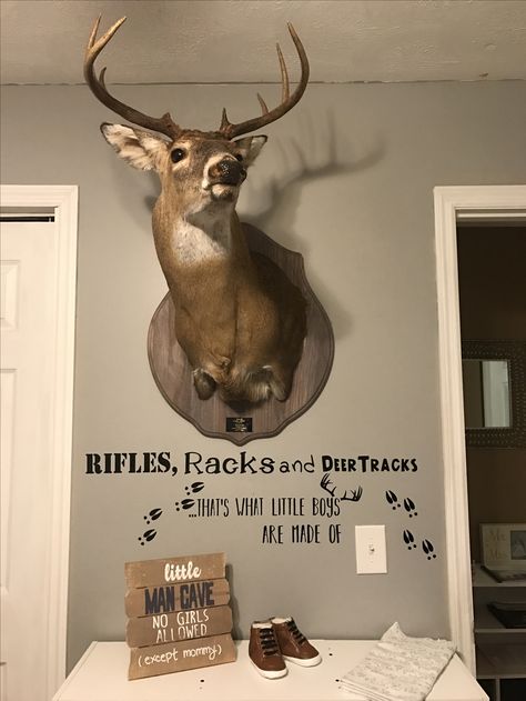 Rifles, racks and deer tracks That's what little boys are made of   My son's nursery ❤️ Hunting Bedroom For Boys, Deer Nursery Ideas Boy, Boy Hunting Nursery, Boys Hunting Room, Deer Themed Nursery, Hunting Bedroom, Baby Boy Hunting, Hunting Nursery, Western Nursery