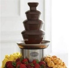 Knowing how to use a chocolate fountain can be the difference between a gorgeous chocolate dessert a Chocolate Fountain Bar, Chocolate Fountain Recipes, Easy Fondue, Chocolate Fondue Fountain, Chocolate Fondue Recipe, Creamy Chocolate Cheesecake, Fondue Fountain, Healthy Chocolate Cake, Chocolate Whoopie Pies