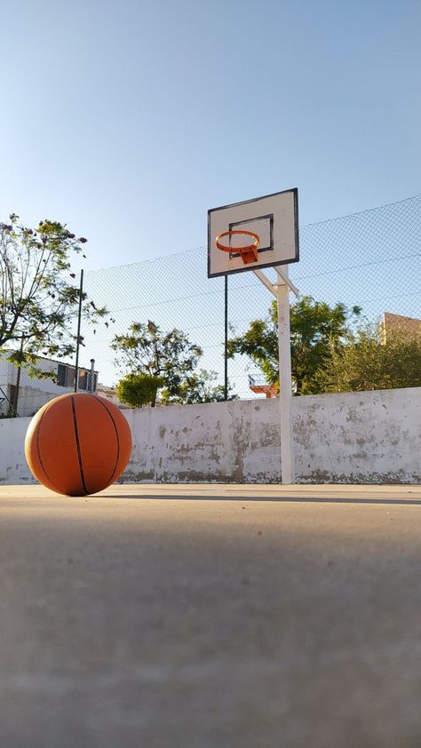 Low-Angle Shot of Basketball on Basketball Court Kitchen Drain Smell, Basketball Court Pictures, Basketball Ground, Smelly Drain, Basketball Pictures Poses, Athlete Training, Outdoor Basketball Court, Basketball Background, Low Angle Shot