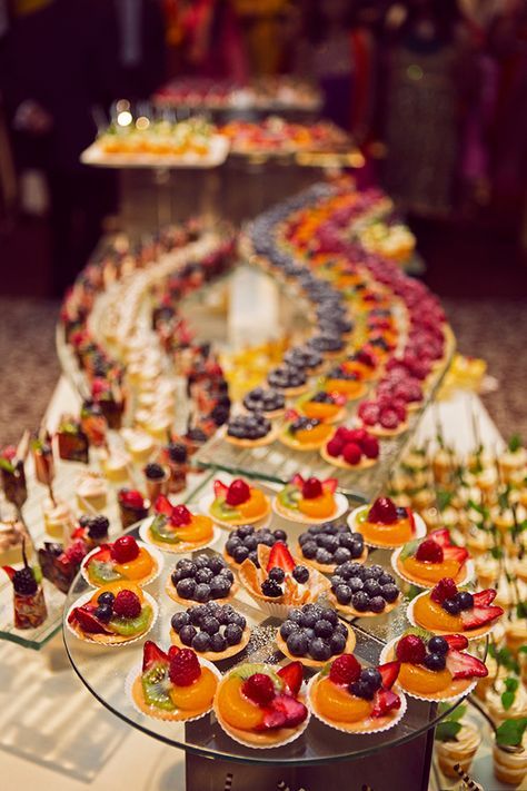 Vibrant Colorful Indian Wedding | A colorful dessert table for a insanely beautiful wedding! Indian Wedding Food, Unique Wedding Food, Wedding Food Display, Fruit Table, Wedding Food Stations, Colorful Desserts, Dessert Fruit, Fruit Displays, Party Food Buffet