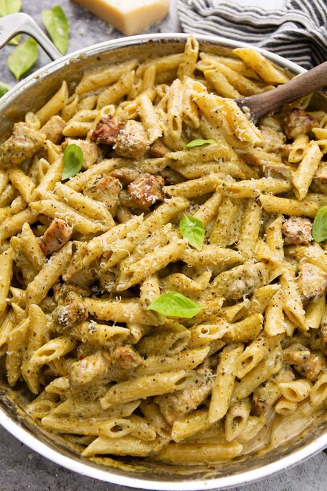 Creamy pesto chicken pasta pairs your favorite pasta with a rich and cheesy sauce bursting with the fresh flavors of garlic and basil pesto. Pesto Pasta Recipes Chicken, Pasta With Green Beans, Creamy Pesto Chicken Pasta, Basil Pesto Pasta, Creamy Pesto Pasta, Pesto Pasta Recipes, Pesto Chicken Pasta, Creamy Pesto, Sausage Pasta