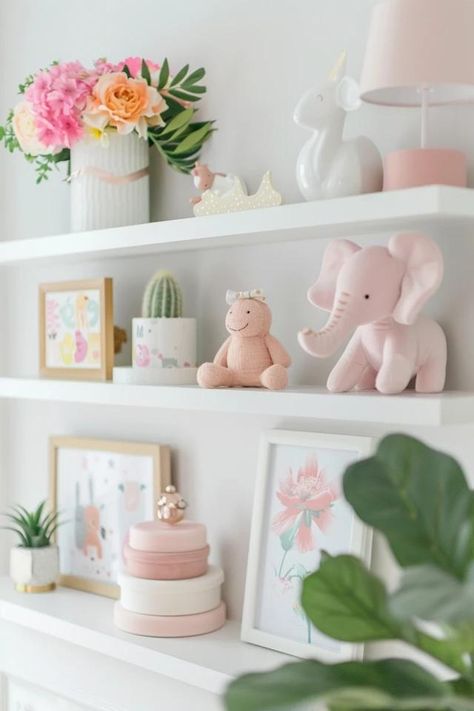 Chic Nursery Shelf Ideas to Organize &amp; Decorate Shelves In Nursery Wall, Bookshelf Baby Room, Nursery Shelf Ideas, Shelves Baby Room, Baby Girl Nursery Shelves, Shelves In Nursery, Decorating Built In Shelves, Girls Bookcase, Nursery Wall Shelf