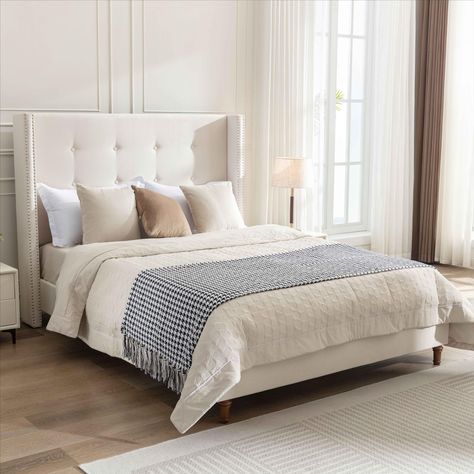 PRICES MAY VARY. Timeless Elegance: Create your dream bedroom with this timeless and elegant bed frame that exudes sophistication and style. Statement Headboard: The 54” tall headboard height makes a bold statement in any bedroom, creating a focal point that enhances the room's ambiance. Elegant Design Details: Embrace gorgeous style with nail-head trim wingback and traditional hand-buttoned tufting, adding a touch of elegance to your bedroom decor. Durable Construction: Solid wood feet with a w Upholstered King Bed Frame, Contemporary Platform Bed, Elegant Bed, High Headboards, High Headboard, Headboard Upholstered, King Upholstered Bed, Wingback Bed, Queen Upholstered Bed