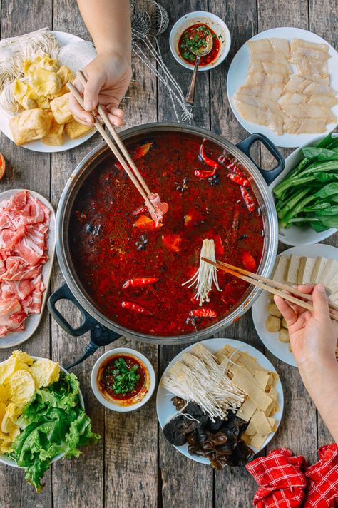 Hot pot is a great meal to make, especially during the colder months. Find out how to assemble a spicy soup base and an authentic Chinese hot pot at home. @thewoksoflife1 Chinese Fondue, Chinese Hot Pot, Hot Pot Recipe, Wok Of Life, Woks Of Life, The Woks Of Life, Soup Base, Mapo Tofu, Spicy Soup