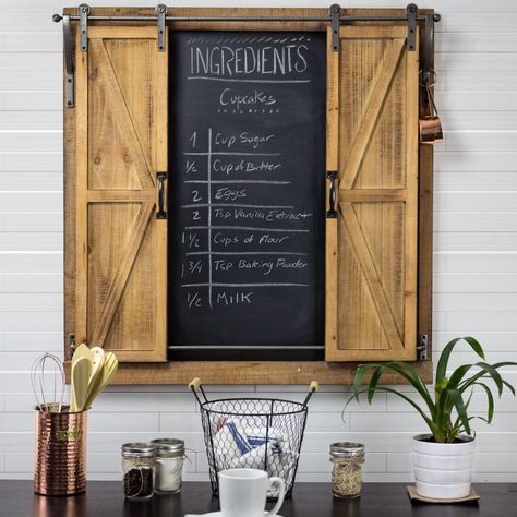 Adorable farmhouse chalkboards – who doesn’t love having a few around the house? We certainly do! Chalkboards meld seamlessly into farmhouse decor because there’s something nostalgically rustic about seeing words written imperfectly in chalk. Read More Chalkboard Organizer, Chalkboard Wall Decor, Kitchen Chalkboard, Chalkboard Decor, Rolling Barn Door, Sliding Barn Doors, Chalkboard Wall, Magnetic Wall, Barn Doors Sliding