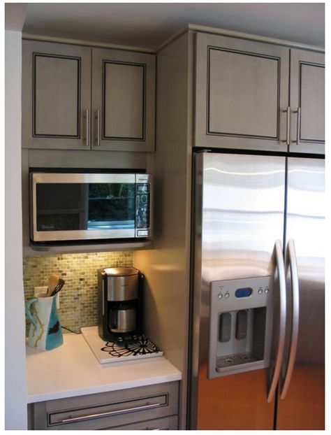 The cabinet is 12" in depth (the shelf is about 15"). Microwave a Panasonic. We added a horizontal filler to close the gap above it and make it look more built-in. GE's Spacemaker and Sharp also makes a few which can go into a 15" deep cabinet. :: pinned from Houzz thread Layout Kitchen, Curtains Kitchen, Remodel Diy, Farmhouse Kitchen Remodel, Microwave In Kitchen, Diy Kitchen Remodel, Eclectic Kitchen, Small Remodel, Kitchen Remodel Before And After