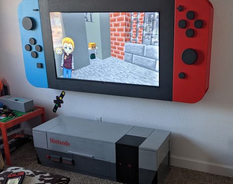 Nintendo Switch Entertainment Center, Nintendo Switch Shelves, Nintendo Tv Frame, Nintendo Switch Storage Ideas, Switch Tv Frame Diy, Switch Tv Frame, Nintendo Switch Tv Frame, Nintendo Bedroom, Gaming Themed Bedroom