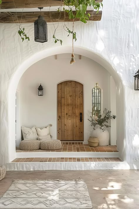 Mediterranean Interior Design: Warm and Inviting Spaces - Quiet Minimal Mediterranean Indoor Decor, House Interior Mediterranean, Mediteranean Houses Interior Decor, Meditterean House Interior, White Mediterranean House, Mediterranean Arches, New Mediterranean Design, Mediterranean Entrance, Mediterranean Living Room Ideas