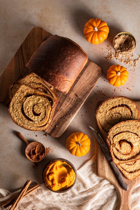 This pumpkin loaf is my annual Thanksgiving comfort food. Full of warm spices and a cinnamon sugar filling, this bread is a cozy way to celebrate fall. Thanksgiving Food Photography, Parts Of Pumpkin, Autumn Food Photography, Autumn Bread, Cinnamon Swirl Bread Recipe, Food Staging, Swirl Bread Recipe, Bakery Photos, Bread Photography