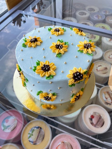 Custom sunflower cake Blue Cake With Sunflowers, Sunflowers Cake Ideas, Cake Designs Sunflower, Sunflower Birthday Cake For Women, Cake Decorating Ideas Funny, Albertsons Cake, Sunflower Cake Ideas Birthday, Cake Designs Fall, Sunflower Smash Cake