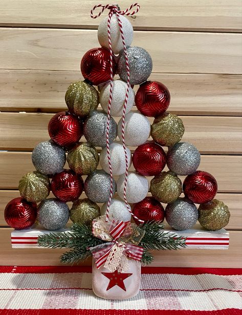 Christmas Ball Christmas Tree, Christmas Ball Ornament Tree Diy, Christmas Tree Bulbs Diy, Christmas Tree Made Out Of Ornaments, Christmas Tree Made Of Ornaments, Ornament Christmas Tree Diy, Diy Ornament Tree, Christmas Ball Tree, Ornament Trees