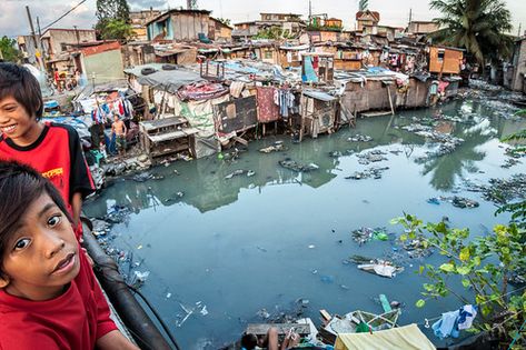 Illegal settlements on Pasig tributary | Two Filipino boys i… | Flickr Gina Lopez, Pasig River, Filipino Boys, River System, Red Shirts, Dumping Ground, Abs Cbn, Hotel Industry, Manila Philippines