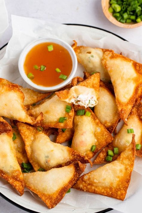 If you love crab rangoon, then you'll adore lobster rangoon! Learn how to make this easy recipe, plus, get tips for the best rangoon every time. Lobster Rangoon, Ti Food, Deep Fried Wontons, Lobster Appetizers, Seafood Meals, Bite Size Snacks, Creamy Parmesan Sauce, Lobster Salad, Crab Rangoon