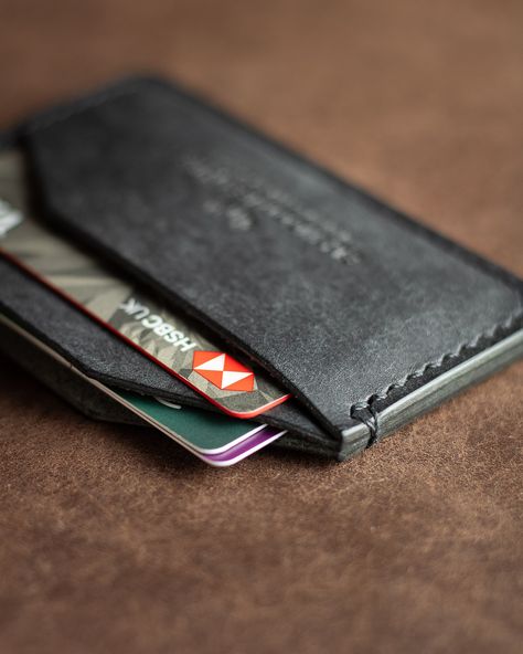 🏴 BLACKOUT ASPEN WALLET 🏴 Wallet Features: - 100% Handmade - Minimal and functional design - Hand-stitched with Premium Waxed Thread - Crafted from Full-grain Italian Leather - Develops a Rugged Patina - Burnished and Waxed Edges - Holds up to 6 Cards + Folded Cash Dimensions - H7cm x W10.5cm #dailycarry #edcwallet #everydaycarry #minimalistwallet #cardholder #cardholderwallet #rugged #fullgrain #fullgrainleather #leather #blackwallet #blackout #madeinengland #elkwoodleather Edc Wallet, Black Wallet, Minimalist Wallet, Card Holder Wallet, Everyday Carry, Functional Design, Full Grain Leather, Hand Stitched, Italian Leather