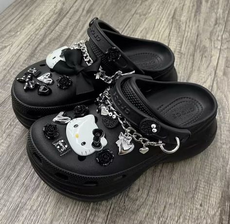 Black Crocs With Hello Kitty Charms, Kuromi Crocs, Emo Crocs, Black Crocs Aesthetic, Black Crocs With Jibbitz, Goth Crocs, Croc Jibbitz Ideas, Hello Kitty Crocs, Croc Ideas