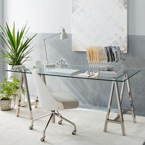 A stunning glass desk with polished nickel sawhorse legs Cheap Office Furniture, Glass Top Desk, Glass Desk Office, Glass Office, Glass Desk, Brand Stickers, Furniture Market, Mom Stuff, Home Office Space