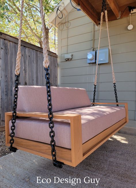 Kona Swing Bench. Details: White oak construction Waterfall arms, offering a continuous grain pattern. Metal chain and rope combination hanging system Metal feet with hook attachments. Choice of finish and fabric. Exclusively Eco Design Guy Custom Hardware, Unique Hardware, Backyard Swings, Weathered Teak, Hanging System, Eco Design, Swinging Chair, Banquette, White Oak