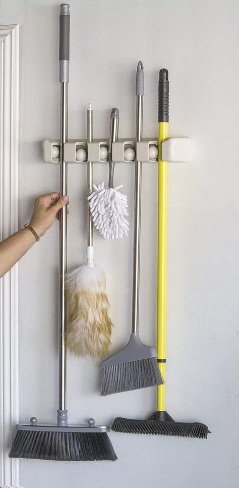 Amazon.com: Magic Holder 5 Position Mop and Broom Holder, Floor Mop Holder, Broom Utility Holder, Storage Solutions and Organizers for Cleaning: Home & Kitchen Kitchen Wall Organizer, Garage Wall Organizer, Mop Storage, Broom Storage, Wand Organizer, Diy Organizer, Broom Holder, Garage Organization Diy, Mops And Brooms