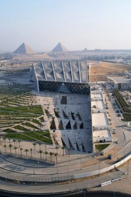 This aerial view photo shows the Grand Egyptian Museum under-construction. Grand Egyptian Museum, Black Abstract Background, Giza Egypt, Egyptian Museum, Building Front, Ancient Egyptian Art, Architecture Design Concept, View Photo, Graduation Project