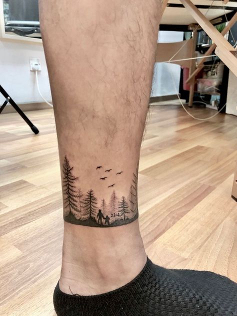 Forest Ankle Tattoo, Minimalist Forest Tattoo, Mountain Ankle Tattoo Wrap Around, Ankle Tattoo Men Ideas, Ankle Band Tattoo Mens, Leg Band Tattoos For Men, Mens Ankle Tattoos, Men’s Ankle Tattoo, Arm Tattoo Band