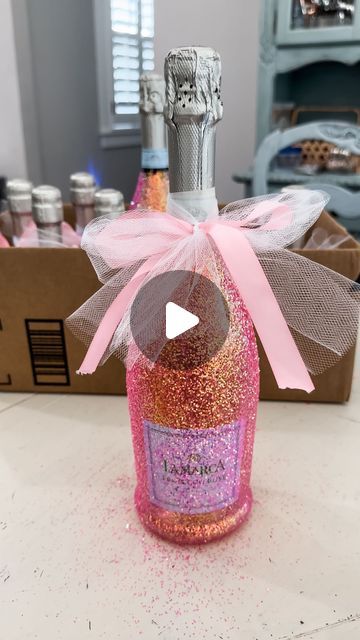 Amy Draper Darley on Instagram: "Sparkle up any celebration with glittery prosecco bottles! ✨🍾 This project turned out so cute & was EXTREMELY easy to do!! Perfect for birthdays or any occasion—just switch up the glitter! 

#DIYPartyIdeas #GlitterProsecco #ModPodgeMagic #DIYGiftIdeas #DIY #DIYGift #Wine #WineBottleGift #EasyGiftIdea #GiftIdea #GiftsForHer #PartyDecor #DIYPartDecor 

Comment SHOP below to receive a DM with the link to shop this post on my LTK ⬇ https://liketk.it/4QcAh #ltkparties #ltkvideo" How To Seal Glitter On Wine Glasses, How To Decorate Wine Bottles As Gifts, Diy Wine Bottle Painting, Prosecco Bottle Decoration, Glitter Champagne Bottle Diy, Decorating Wine Bottles, Glitter Bottle Diy, Diy Alcohol Gifts, Wine Exchange