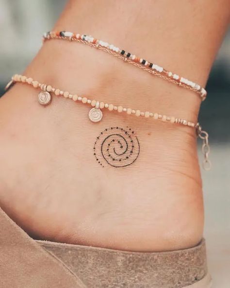 Beautiful Tiny Tattoos, Spiral Ankle Tattoo, Spiritual Ankle Tattoos For Women, Nordic Tattoos Women, Upper Back Neck Tattoo For Women, Misneach Tattoo, Tiny Spiral Tattoo, Ladies Ankle Tattoos, Small Spiral Tattoo