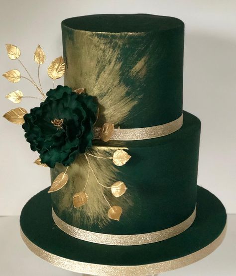 A 2 Tier Emerald Green Engagement Cake with Gold Brush Strokes and Peony! Tiers in Salted Caramel and Red Velvet! Massive Congratulations… Green Cakes Wedding, Wedding Dresses With Emerald Green Accents, Wedding Cake Ideas Emerald Green, Emerald Green Gold Cake, Wedding Cake Designs Emerald Green And Gold, Emerald Green And Gold Cake Birthday, Wedding Cakes Emerald Green And Gold, Cake Emerald Green And Gold, Emerald And Gold Wedding Cake